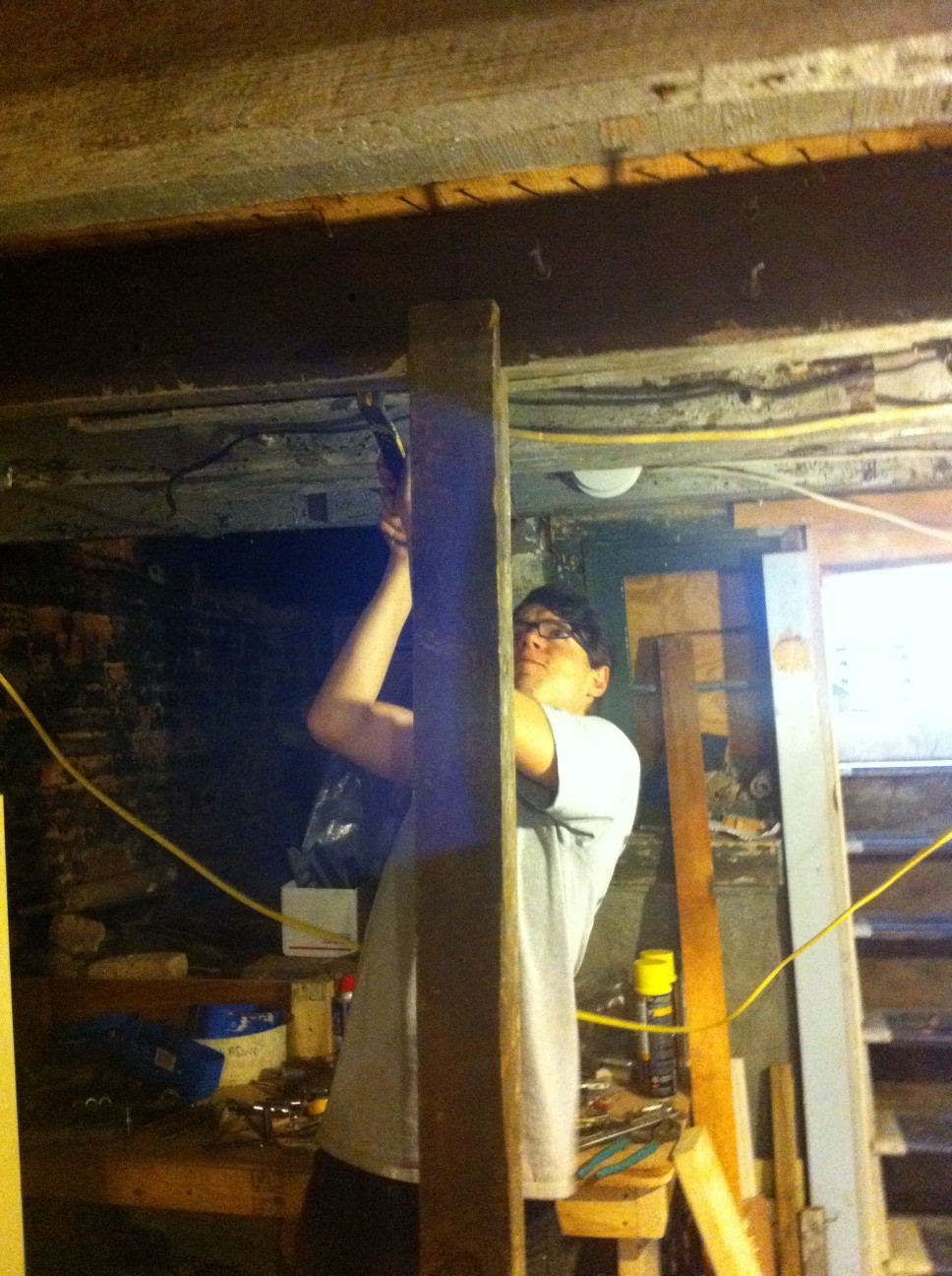 Here I am tearing out the old joists.